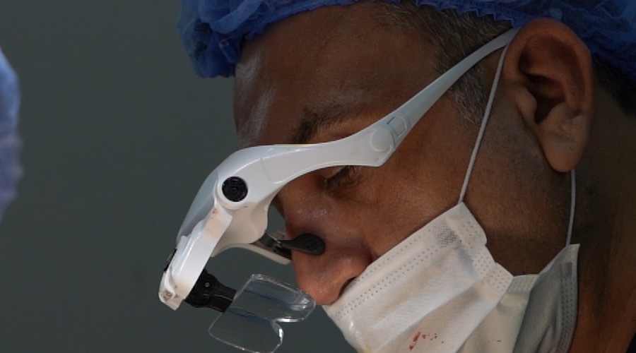 Advanced hair restoration technique under magnification