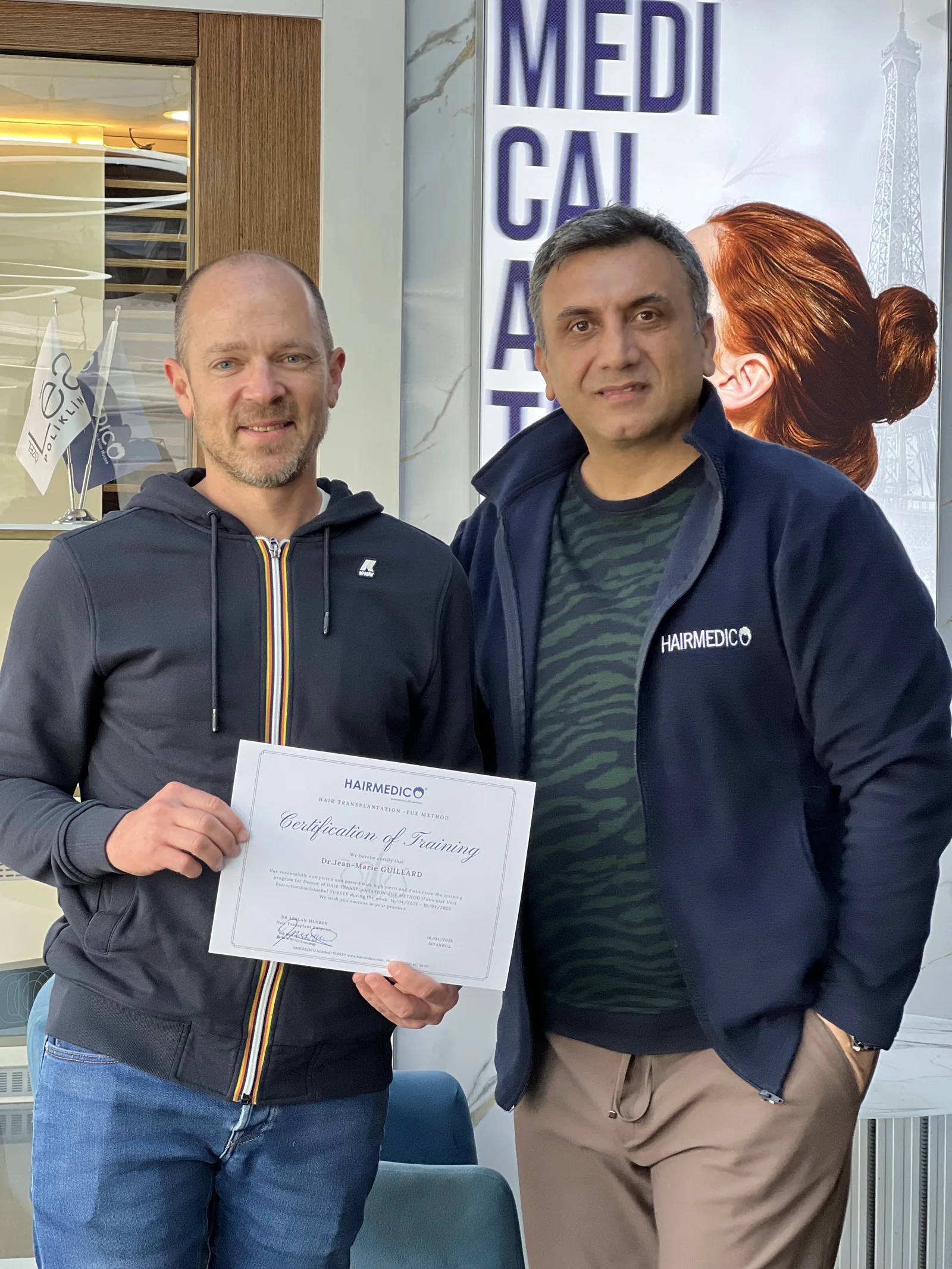 Dr. Arslan Musbeh and a certified physician holding the completion diploma