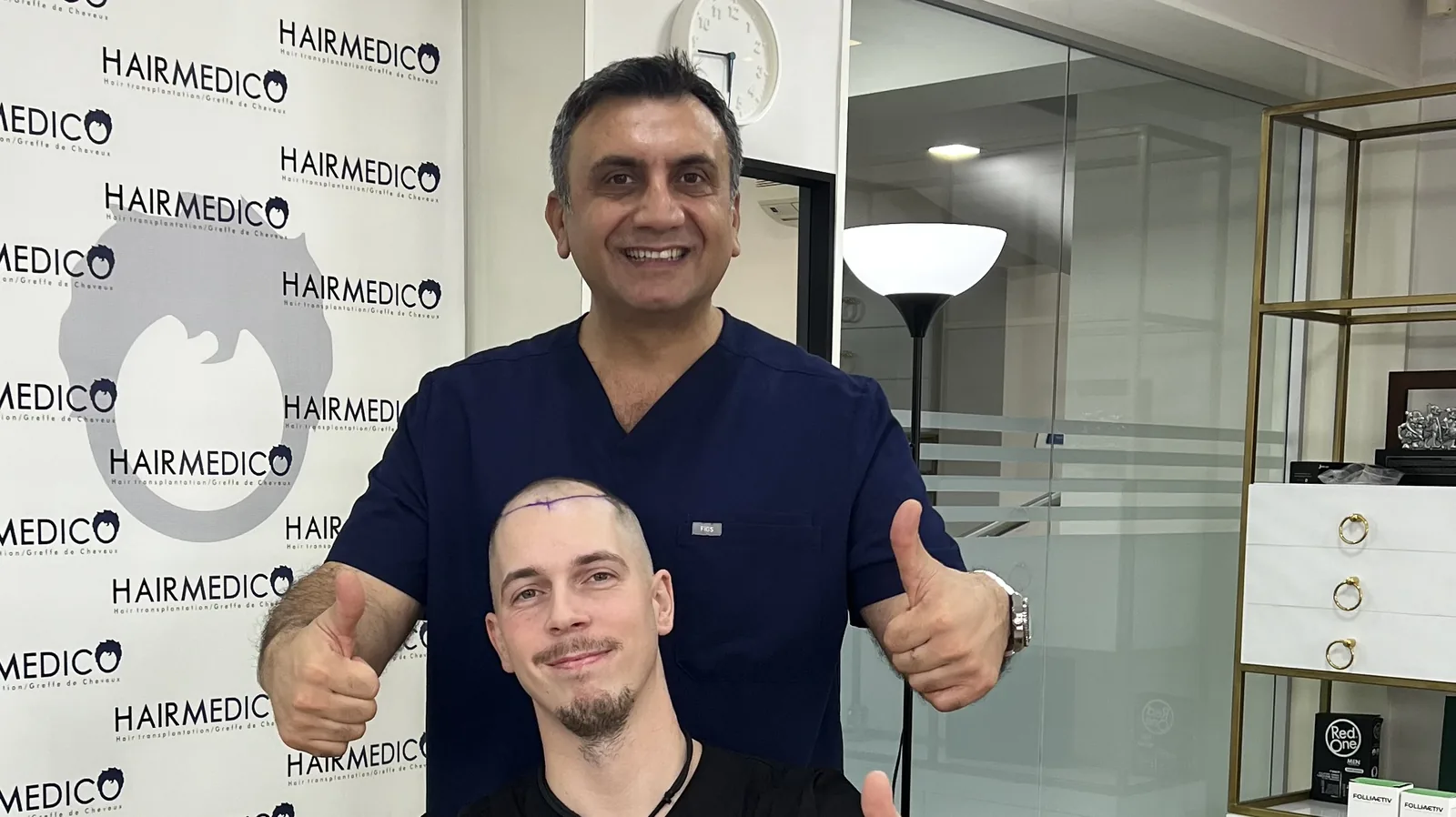 Dr. Arslan Musbeh and a patient giving a thumbs-up after his hairline design is marked at Hairmedico Istanbul