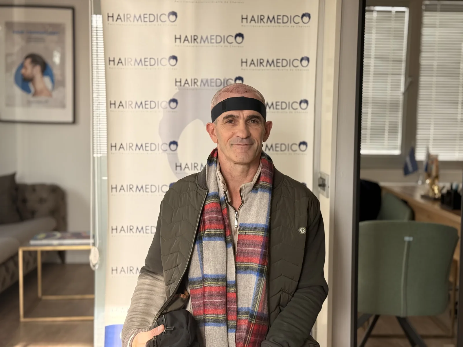 Hairmedico patient wearing protective headband at the Istanbul clinic shortly after his procedure, ready to travel home