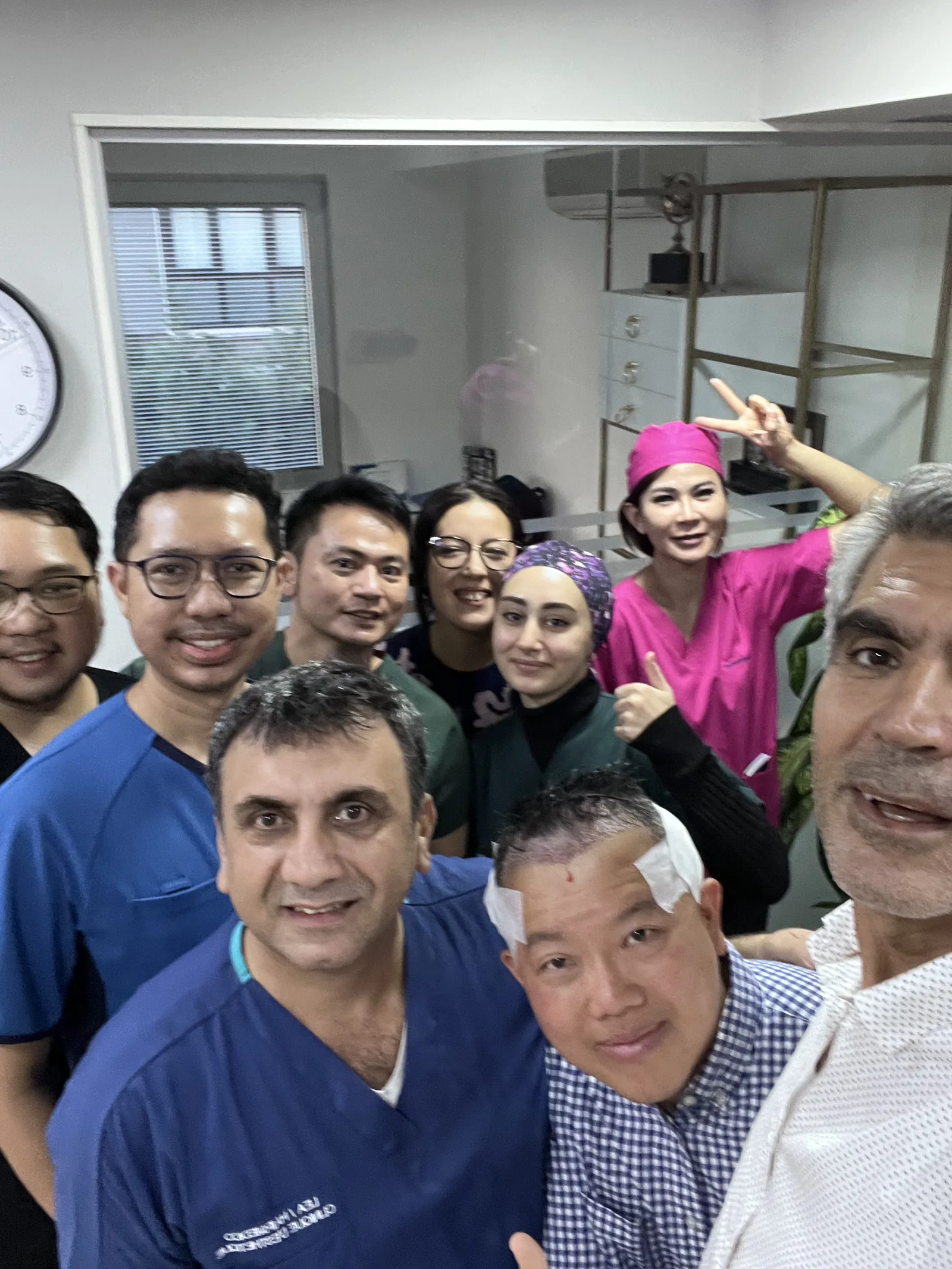 Dr Arslan Musbeh and the Hairmedico surgical team with a patient at the Levent clinic, shortly after his procedure